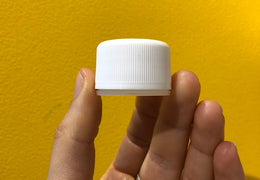 Bouchon plastique pour flacon en verre