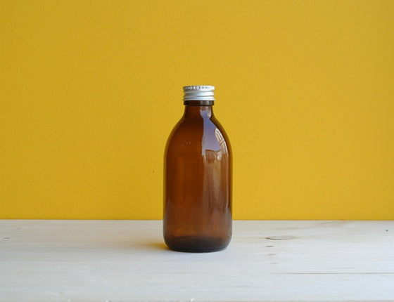 Flacon en verre teinté 250 ml